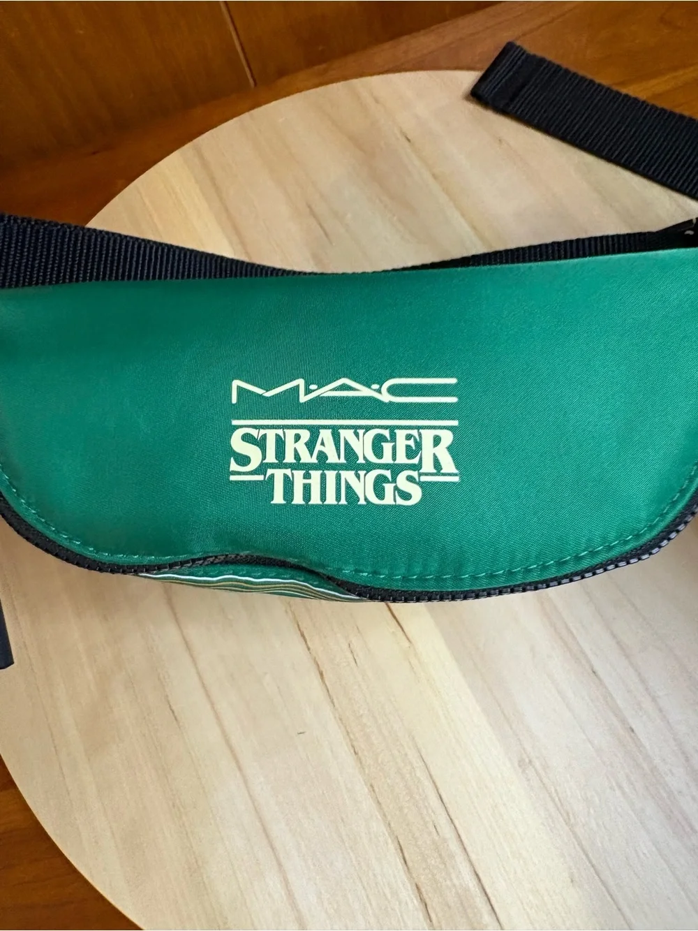 limited-edition MAC Cosmetics x Stranger Things Hawkins Tigers waist bag,